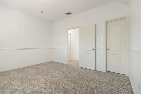 an empty room with an entryway