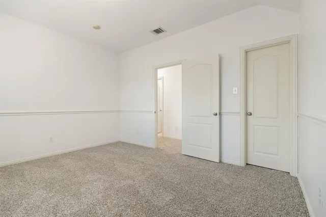 an empty room with an entryway