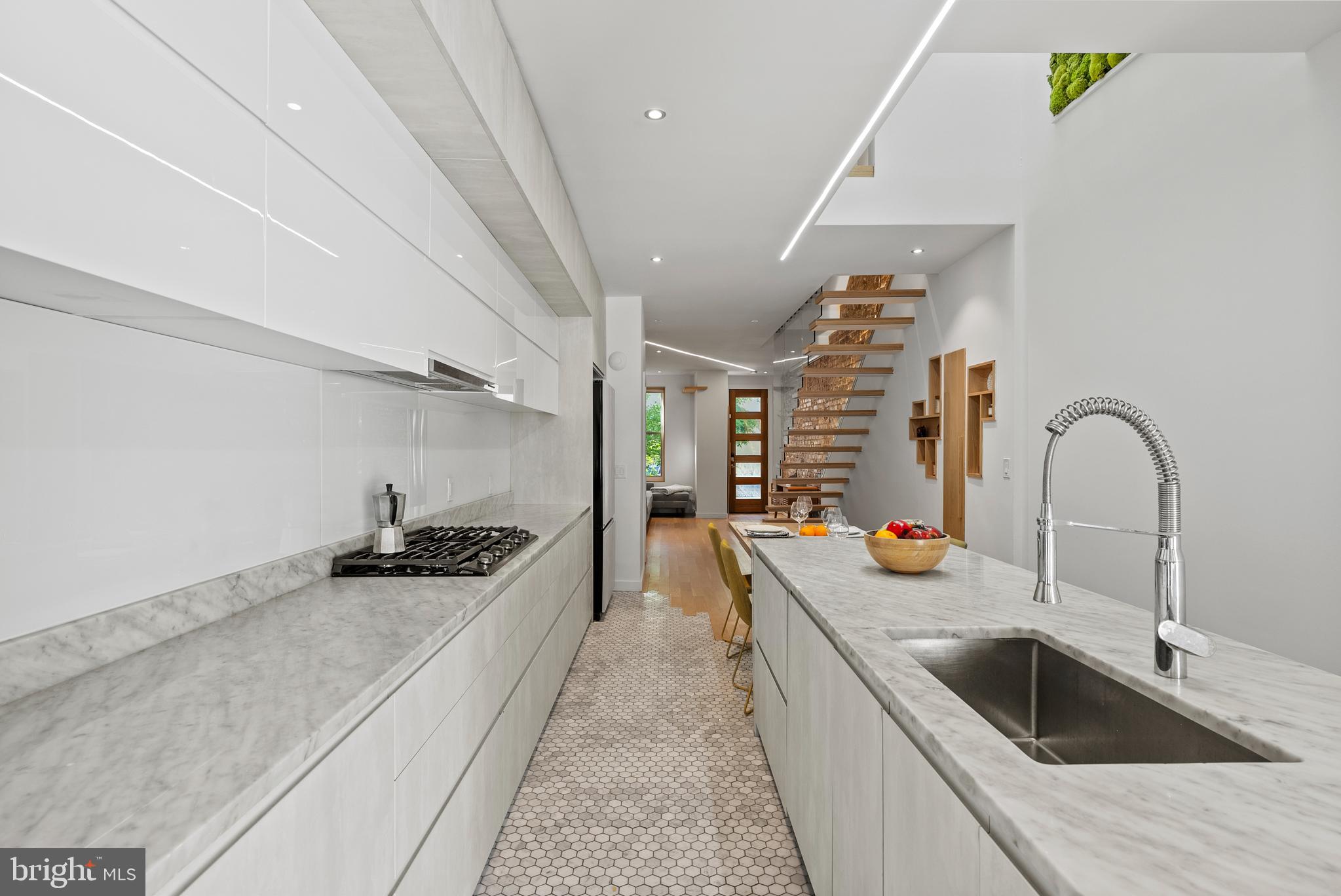 1670 Kalorama Road Northwest Washington, DC 20009 - Photo 14 of 36 Large marble island with ample storage