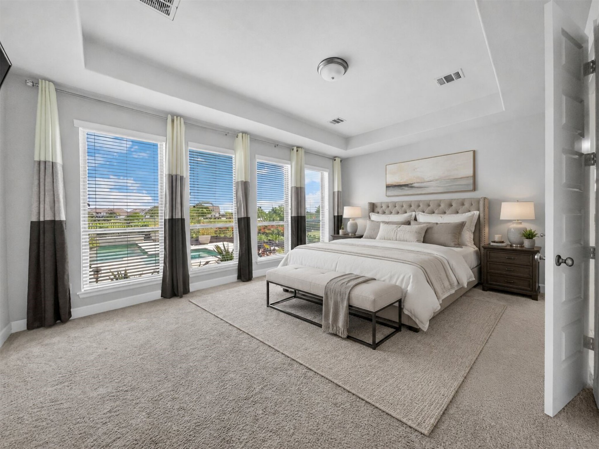 4343 Martin Ridge Drive Manvel, TX 77578 - Photo 20 of 50 a spacious bedroom with a large bed and a large window