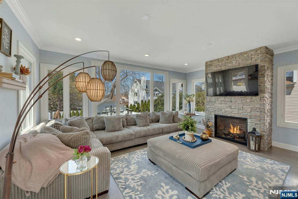 158 Carmita Avenue Rutherford, NJ 07070 - Photo 15 of 43 a living room with furniture fireplace and a flat screen tv