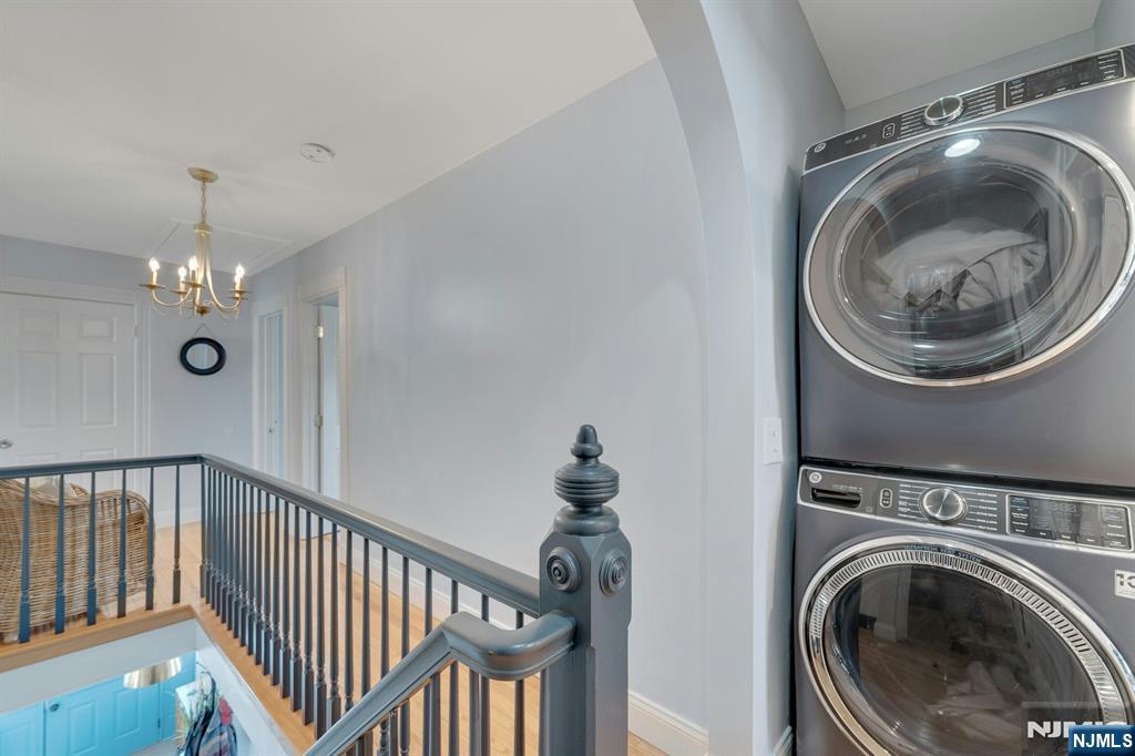 158 Carmita Avenue Rutherford, NJ 07070 - Photo 19 of 43 a view of a hallway with washer and dryer