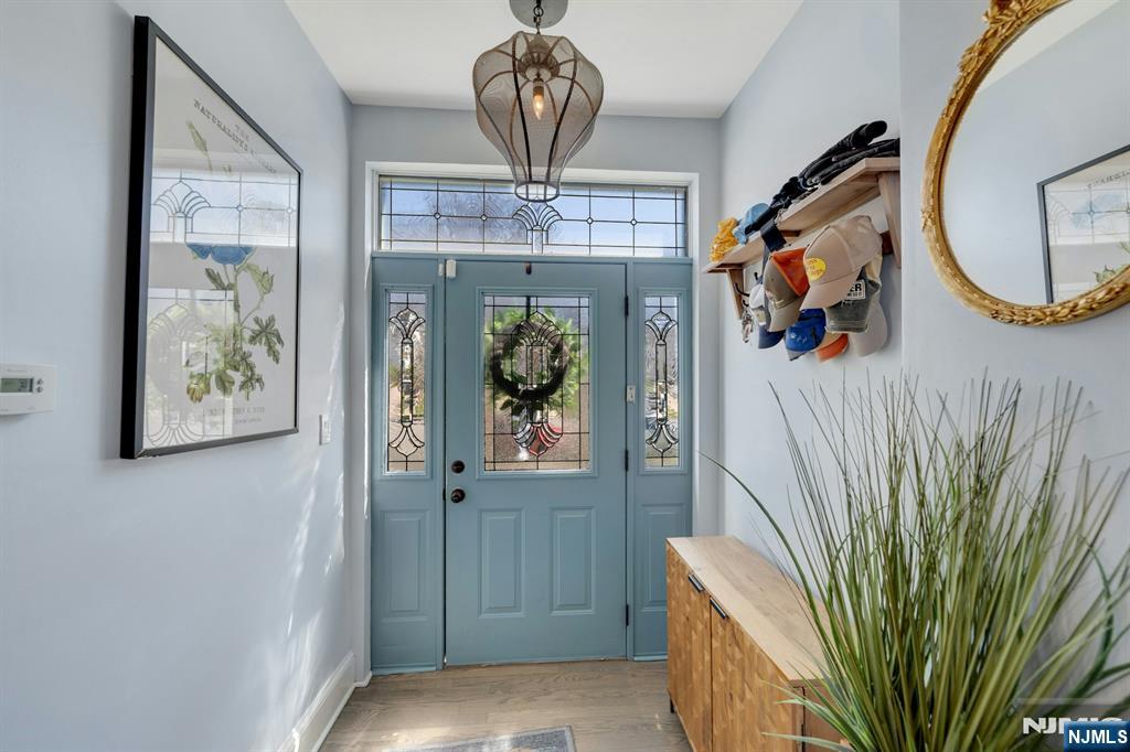 158 Carmita Avenue Rutherford, NJ 07070 - Photo 3 of 43 a view of a hallway with a elevator