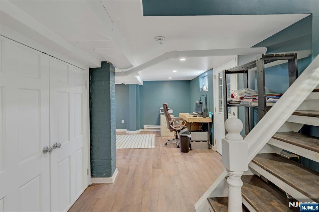 158 Carmita Avenue Rutherford, NJ 07070 - Photo 34 of 43 a living room with furniture and a piano