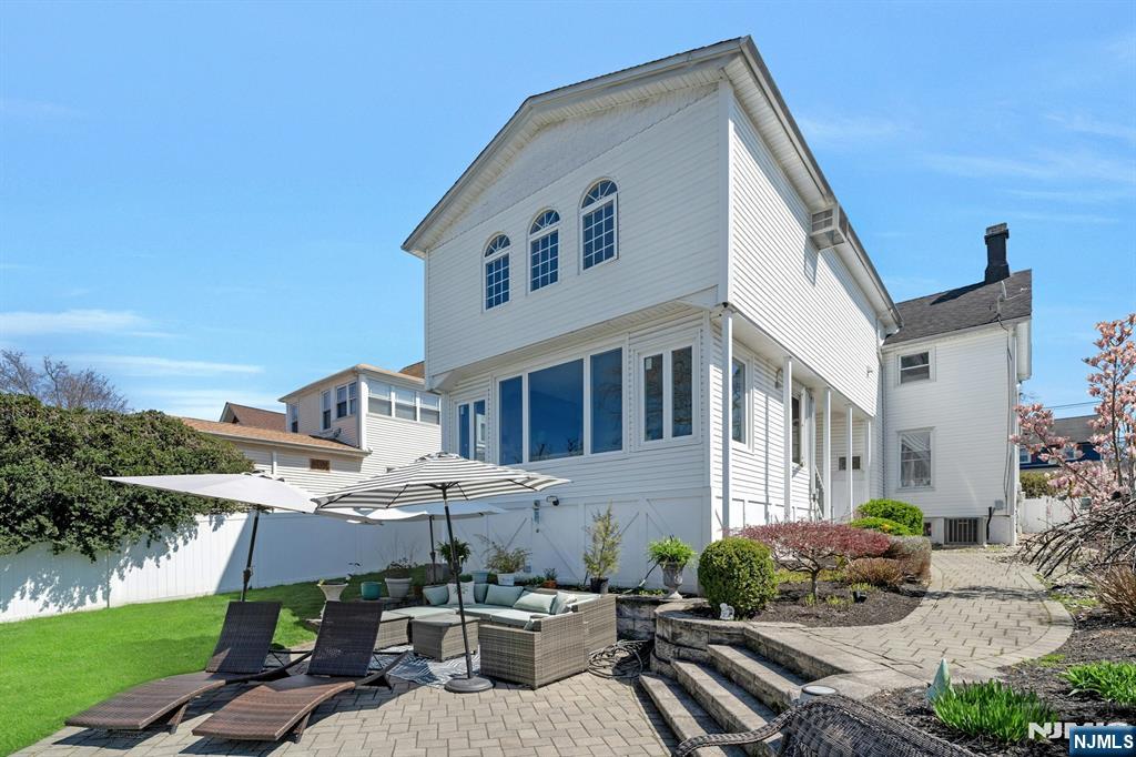 158 Carmita Avenue Rutherford, NJ 07070 - Photo 37 of 43 a front view of a house with garden