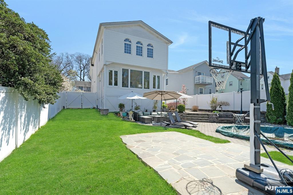 158 Carmita Avenue Rutherford, NJ 07070 - Photo 38 of 43 a view of a house with backyard and sitting area
