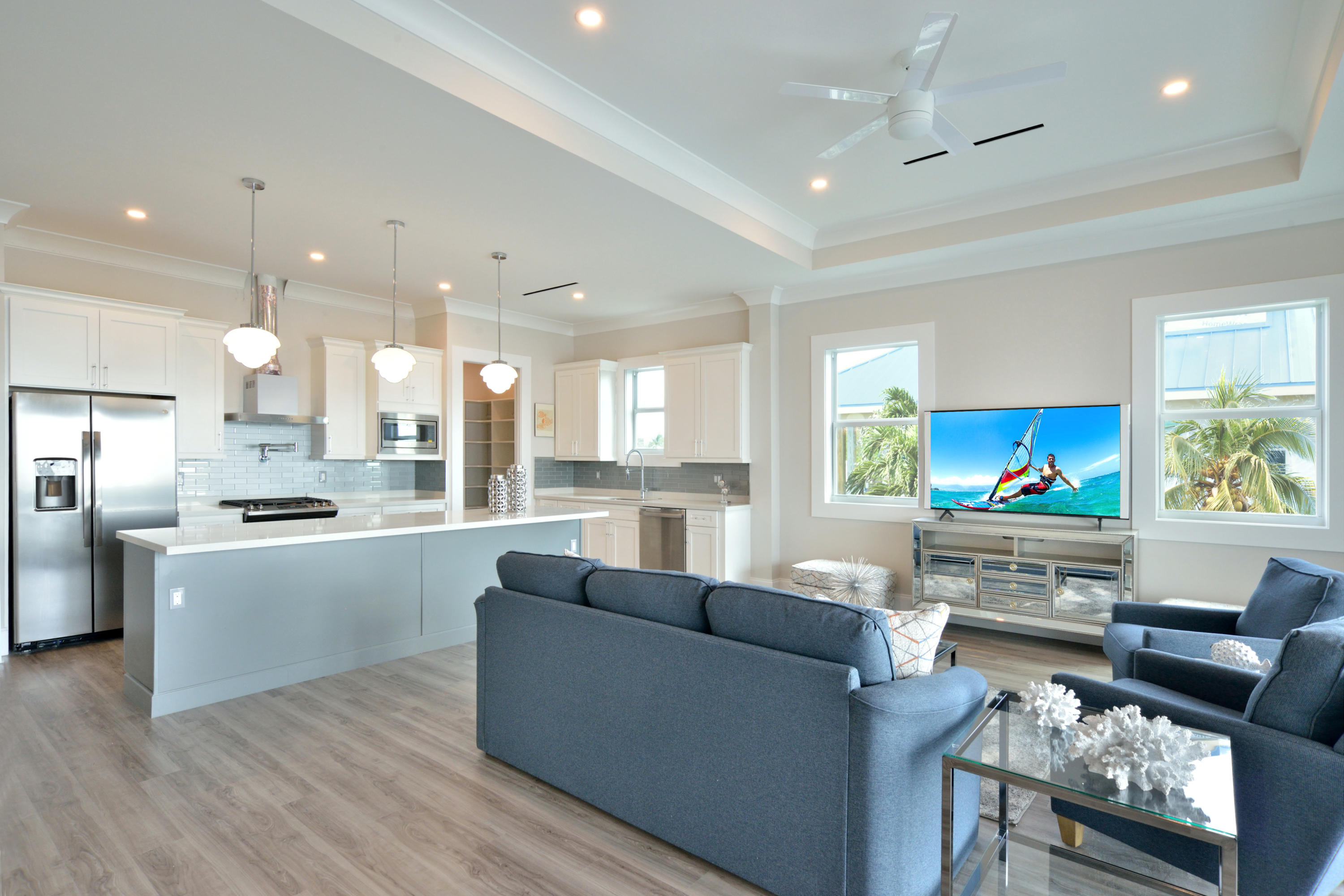 37 Key Haven Road Key West, FL 33040 - Photo 4 of 9 a living room with stainless steel appliances kitchen island granite countertop a couch and a view of living room
