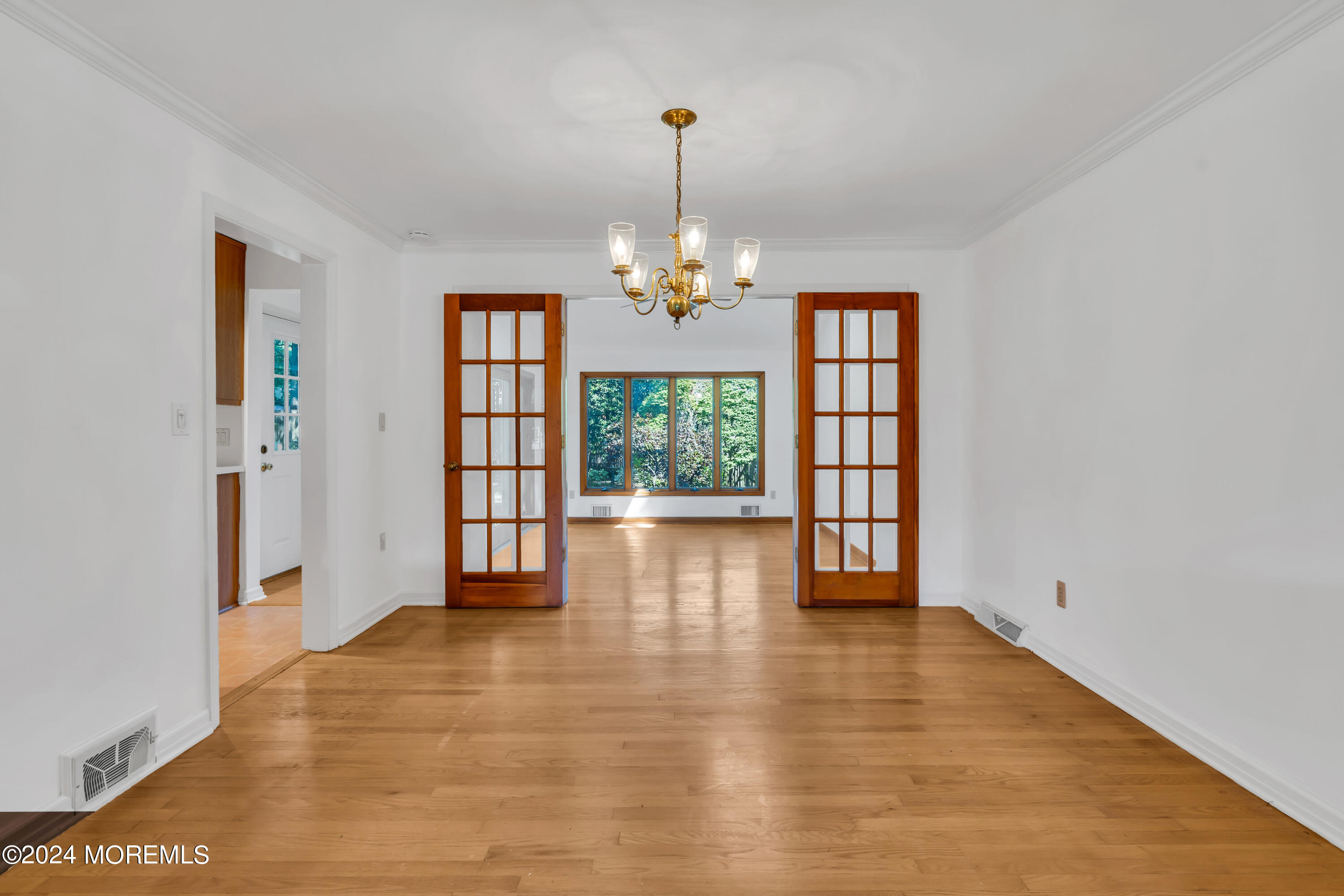 85 Hance Road Fair Haven, NJ 07704 - Photo 12 of 42 wooden floor in an empty room with a window