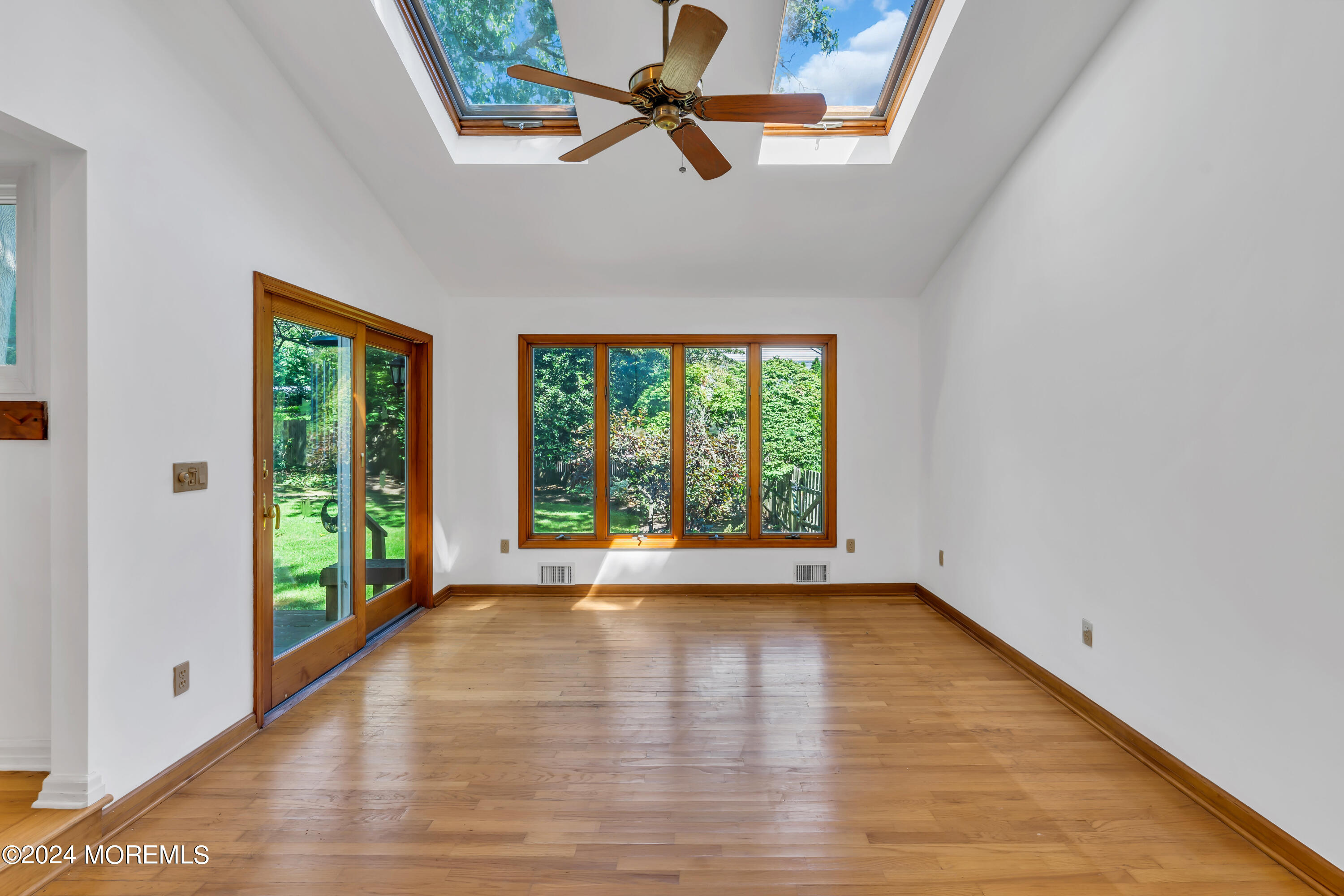85 Hance Road Fair Haven, NJ 07704 - Photo 13 of 42 a view of room with window and wooden floor