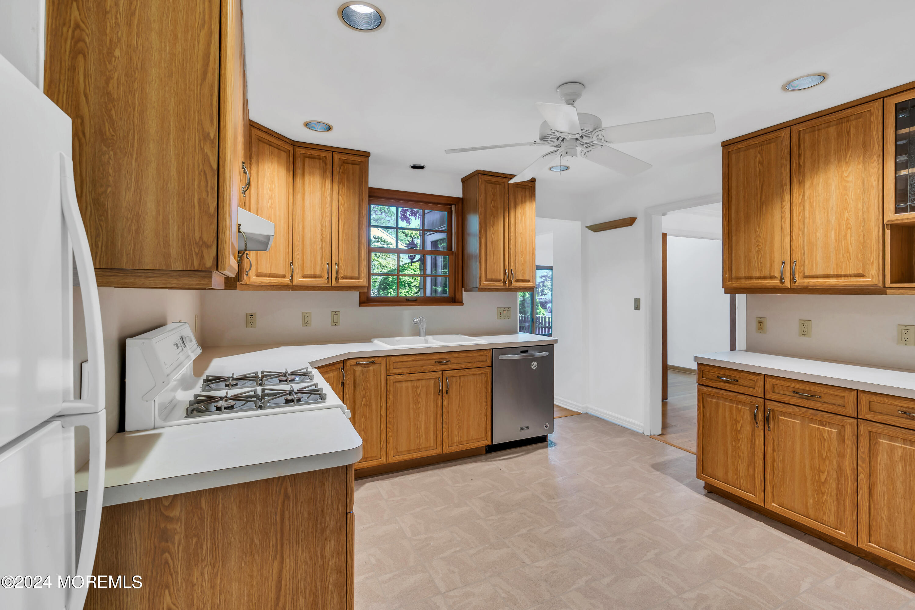 85 Hance Road Fair Haven, NJ 07704 - Photo 16 of 42 a kitchen with a stove a sink and a refrigerator