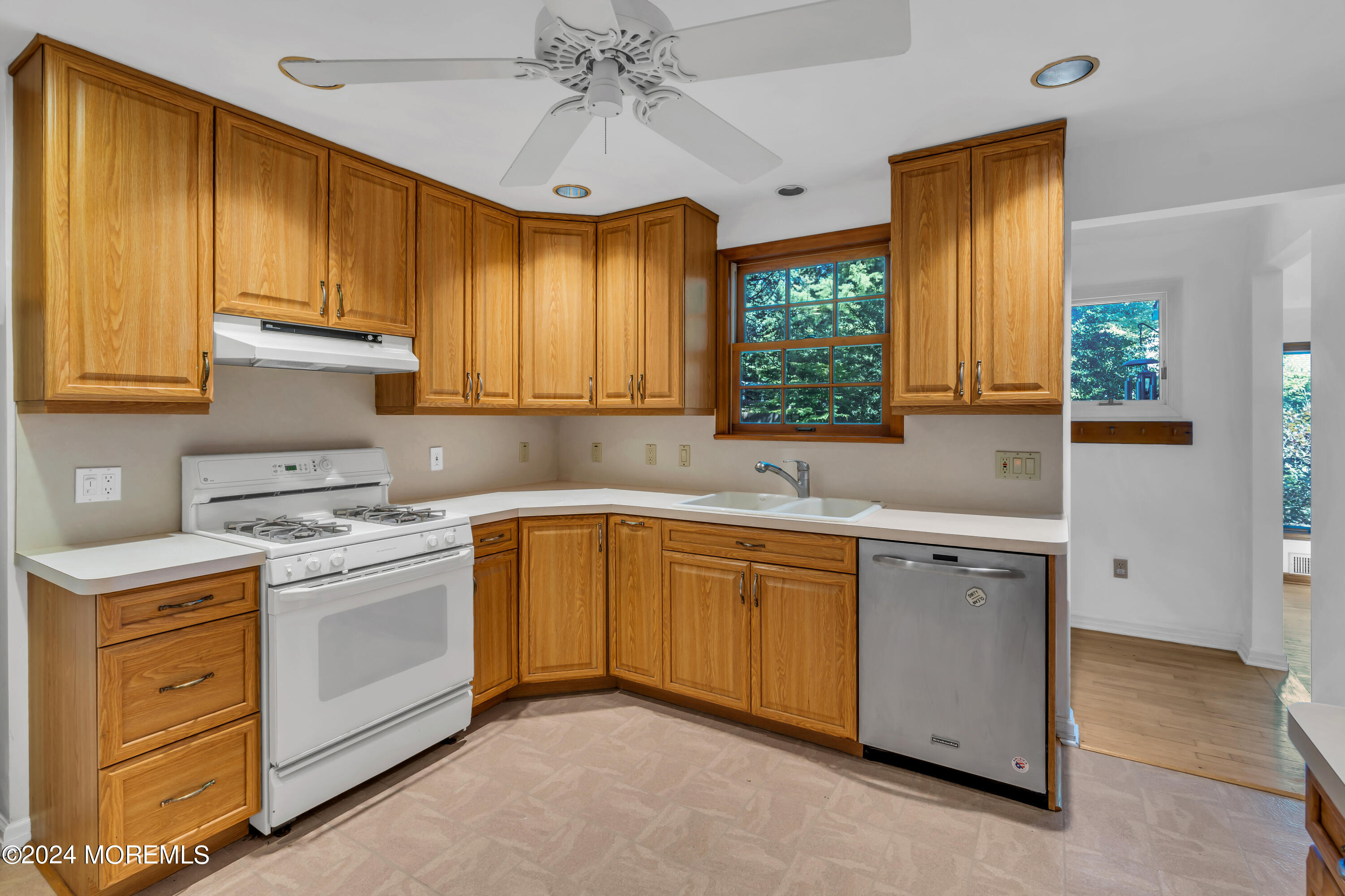 85 Hance Road Fair Haven, NJ 07704 - Photo 19 of 42 a kitchen with granite countertop cabinets stainless steel appliances a sink and a window