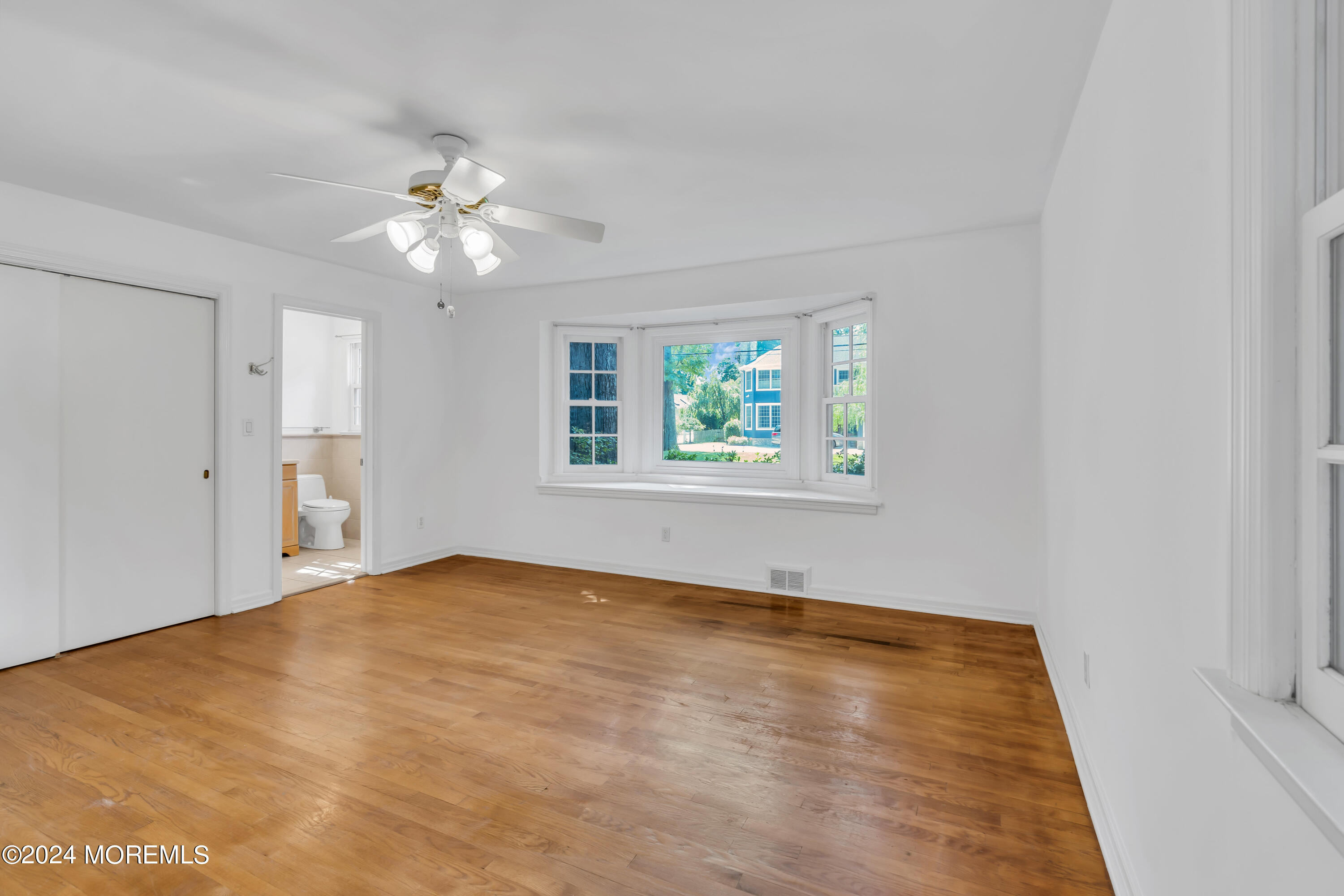 85 Hance Road Fair Haven, NJ 07704 - Photo 21 of 42 a view of an empty room with a window