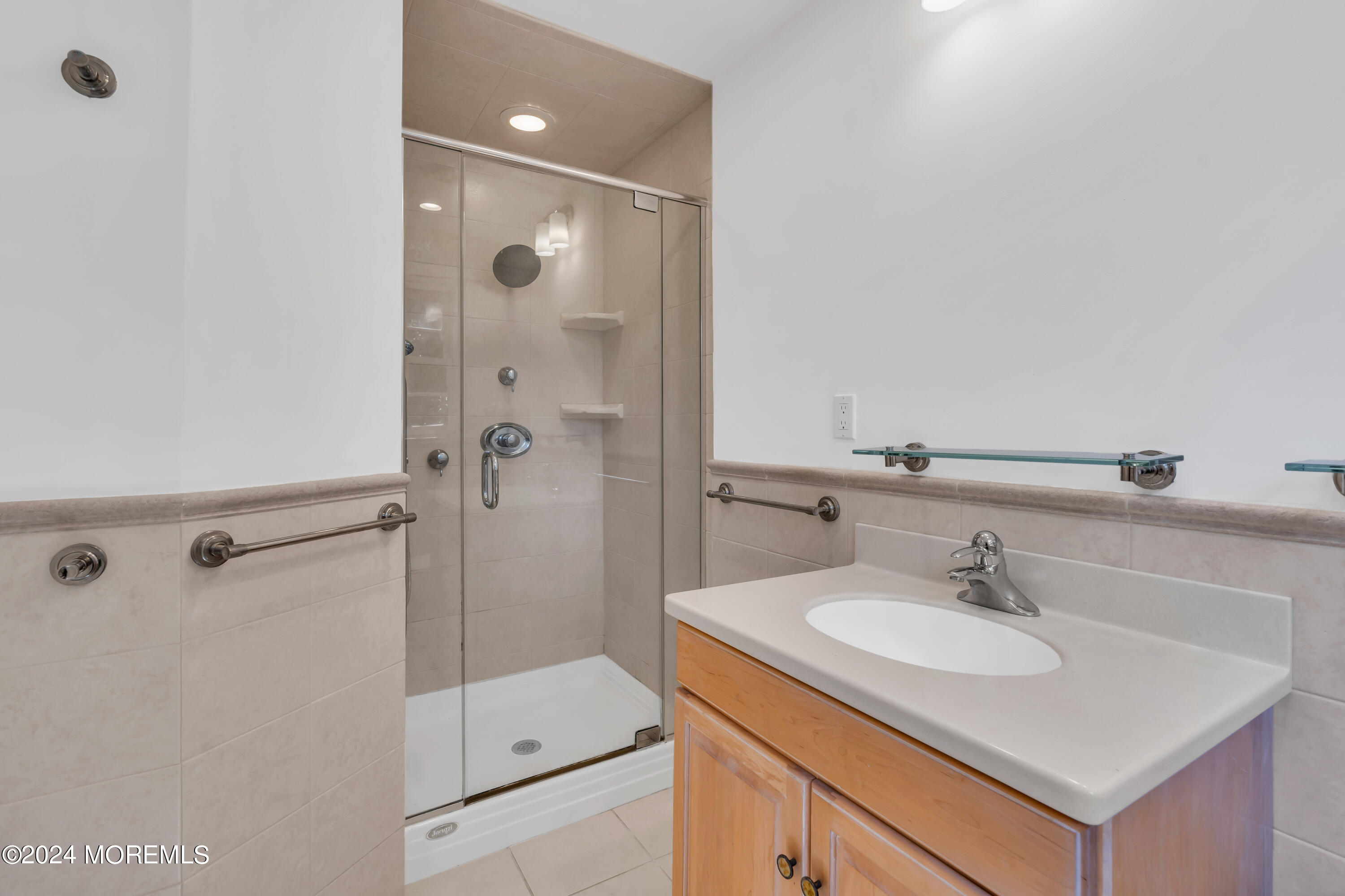 85 Hance Road Fair Haven, NJ 07704 - Photo 23 of 42 a bathroom with a sink shower and a mirror