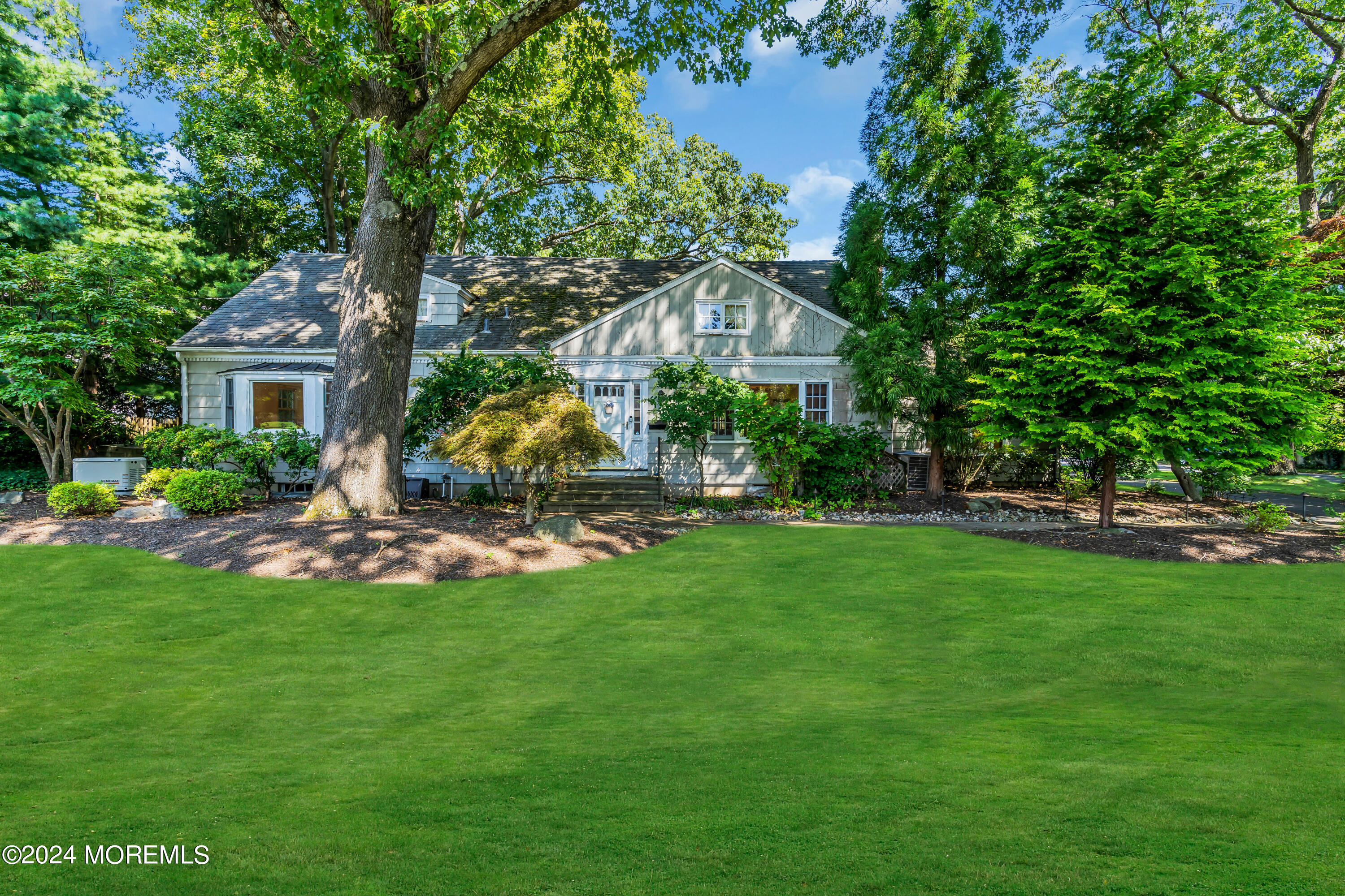 85 Hance Road Fair Haven, NJ 07704 - Photo 3 of 42 a view of a house with a backyard porch and sitting area
