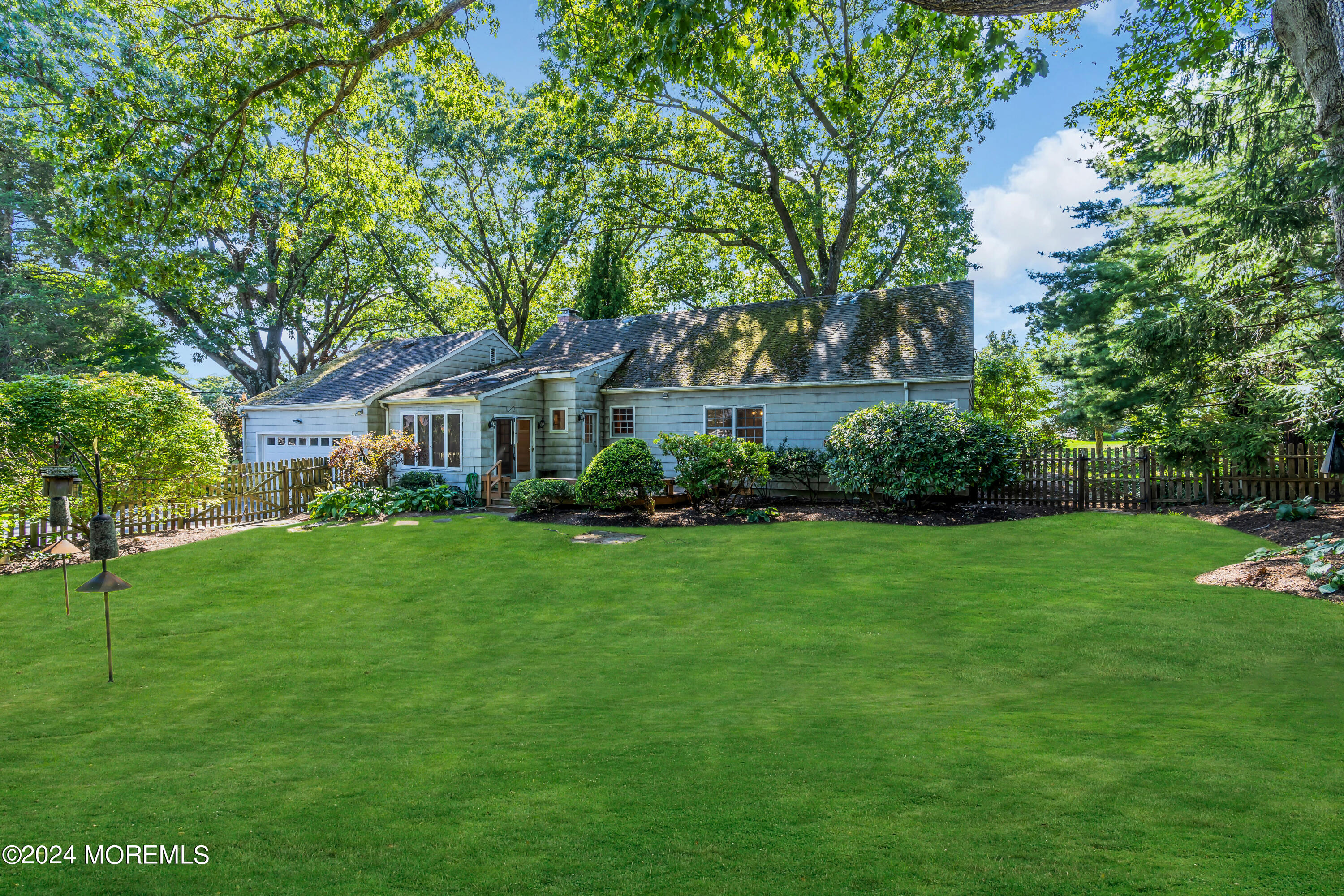 85 Hance Road Fair Haven, NJ 07704 - Photo 32 of 42 a front view of a house with garden