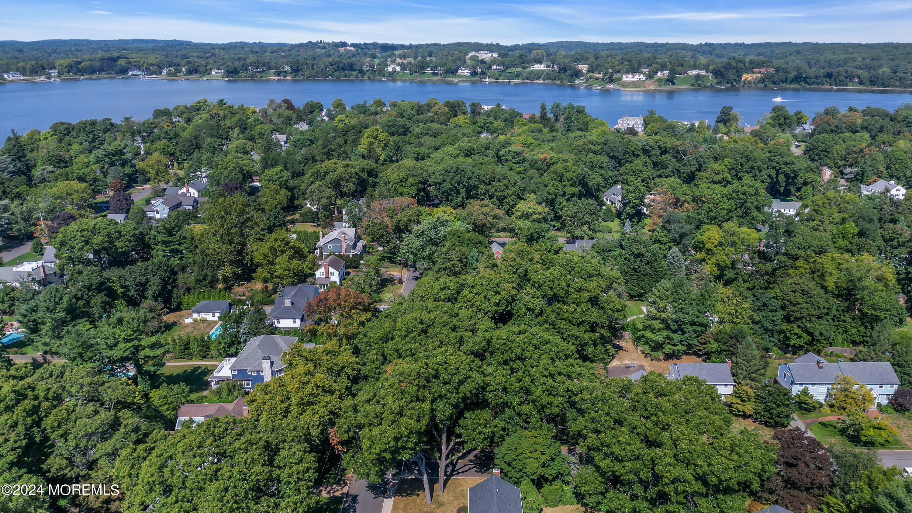85 Hance Road Fair Haven, NJ 07704 - Photo 38 of 42 an aerial view of a houses with a yard and lake view