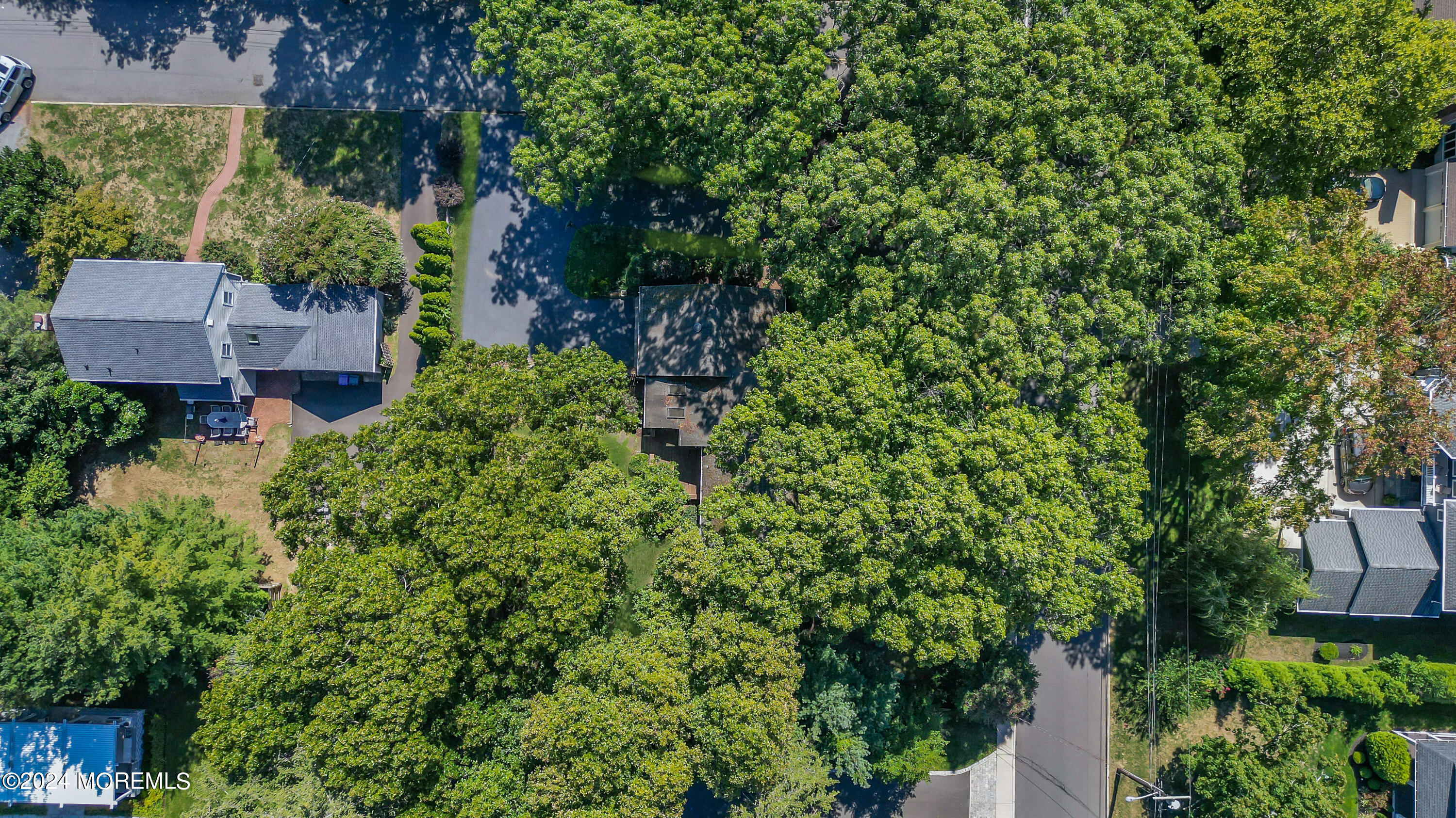 85 Hance Road Fair Haven, NJ 07704 - Photo 41 of 42 an aerial view of a house with a yard