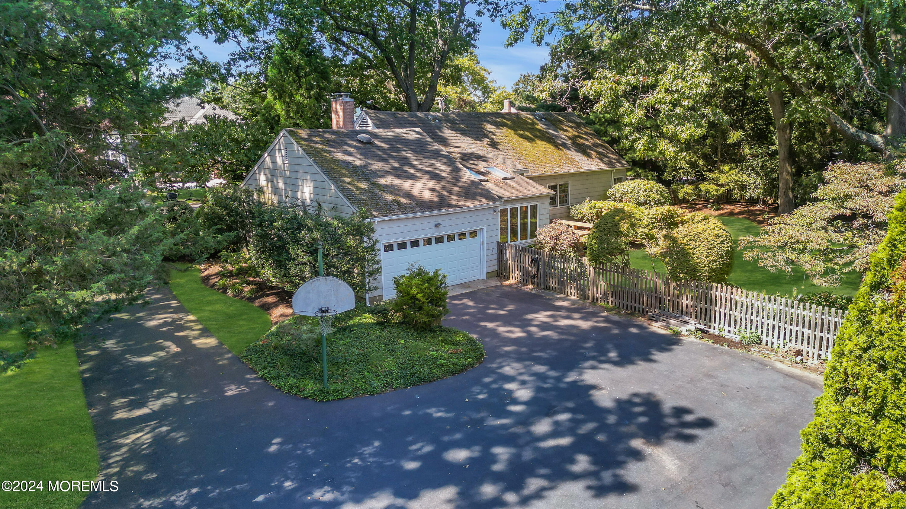 85 Hance Road Fair Haven, NJ 07704 - Photo 42 of 42 a view of a house with a tree and plants