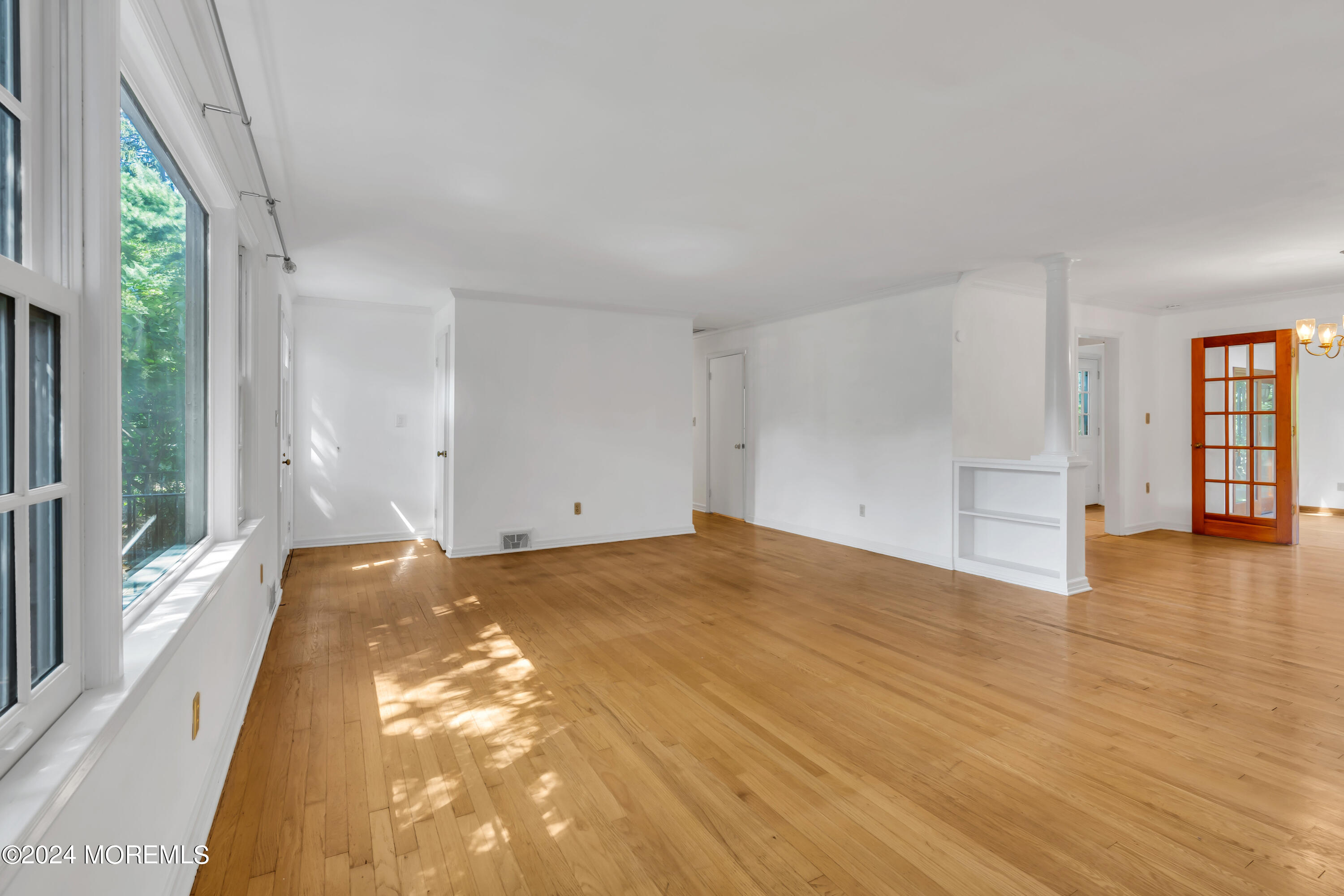 85 Hance Road Fair Haven, NJ 07704 - Photo 6 of 42 a view of an empty room and window