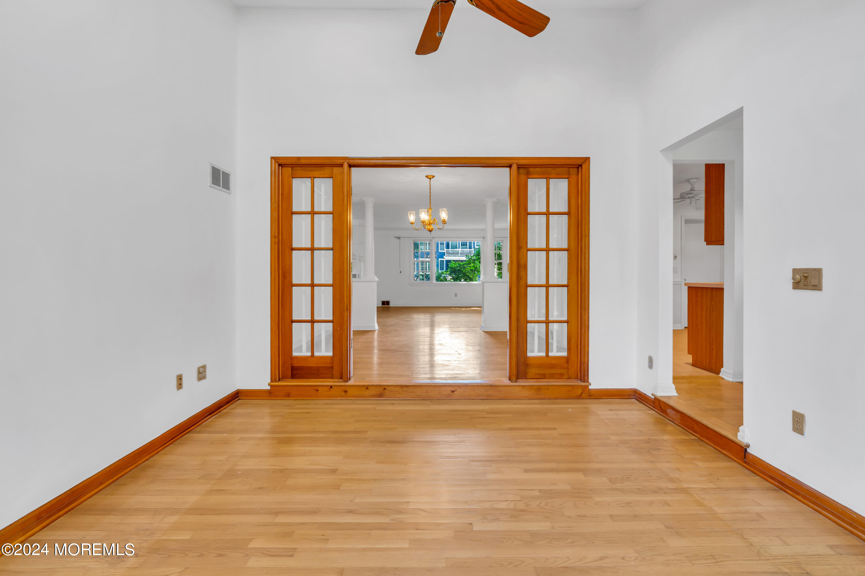 85 Hance Road Fair Haven, NJ 07704 - Photo 10 of 42 a view of empty room with floor to ceiling window