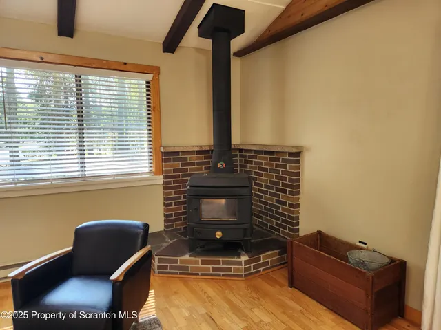 a room with window and wooden floor