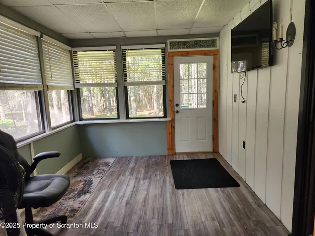 a view of a utility room with a bathroom