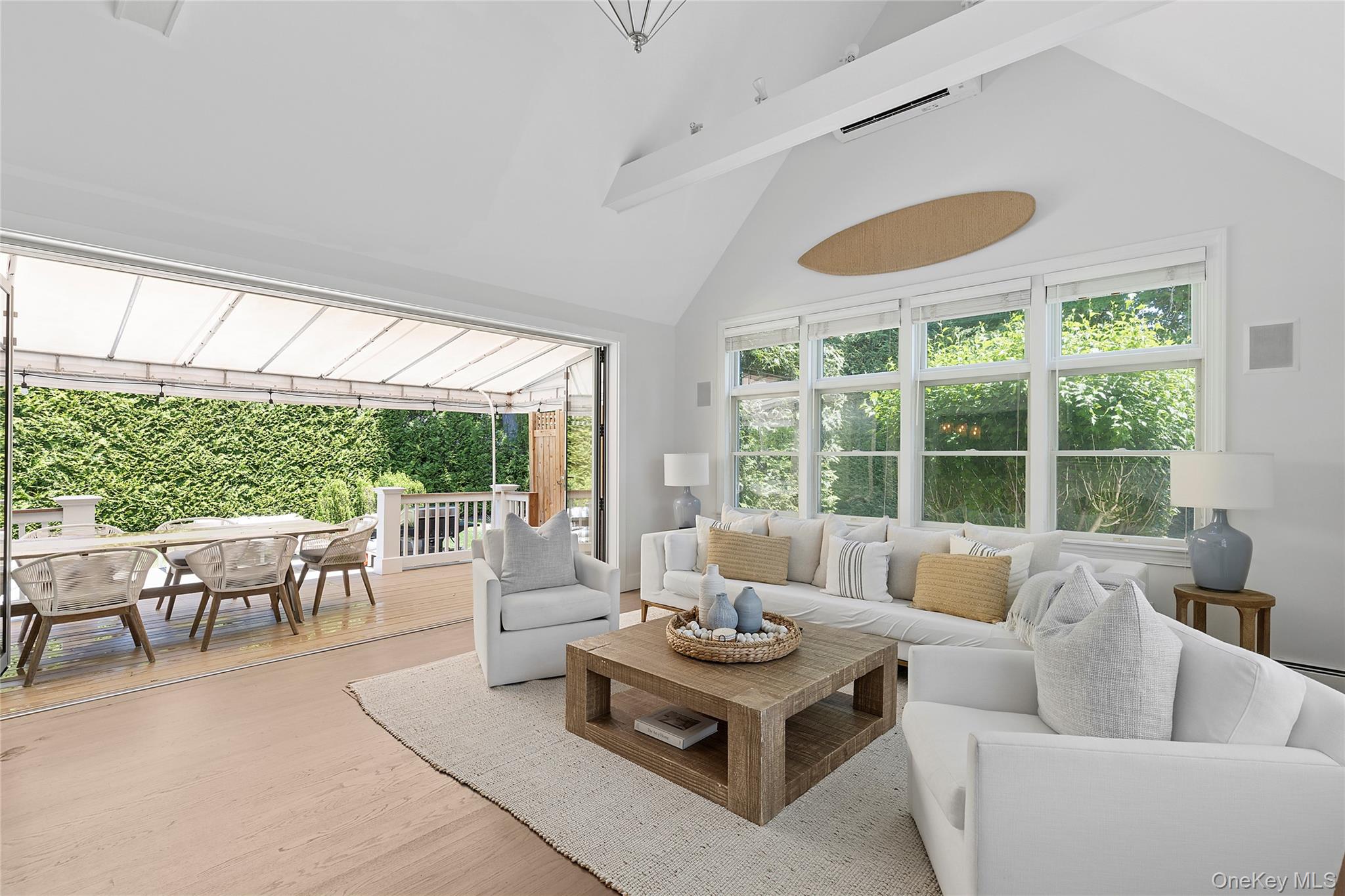 31 Highland Road Southampton, NY 11968 - Photo 7 of 19 a living room with furniture and a large window