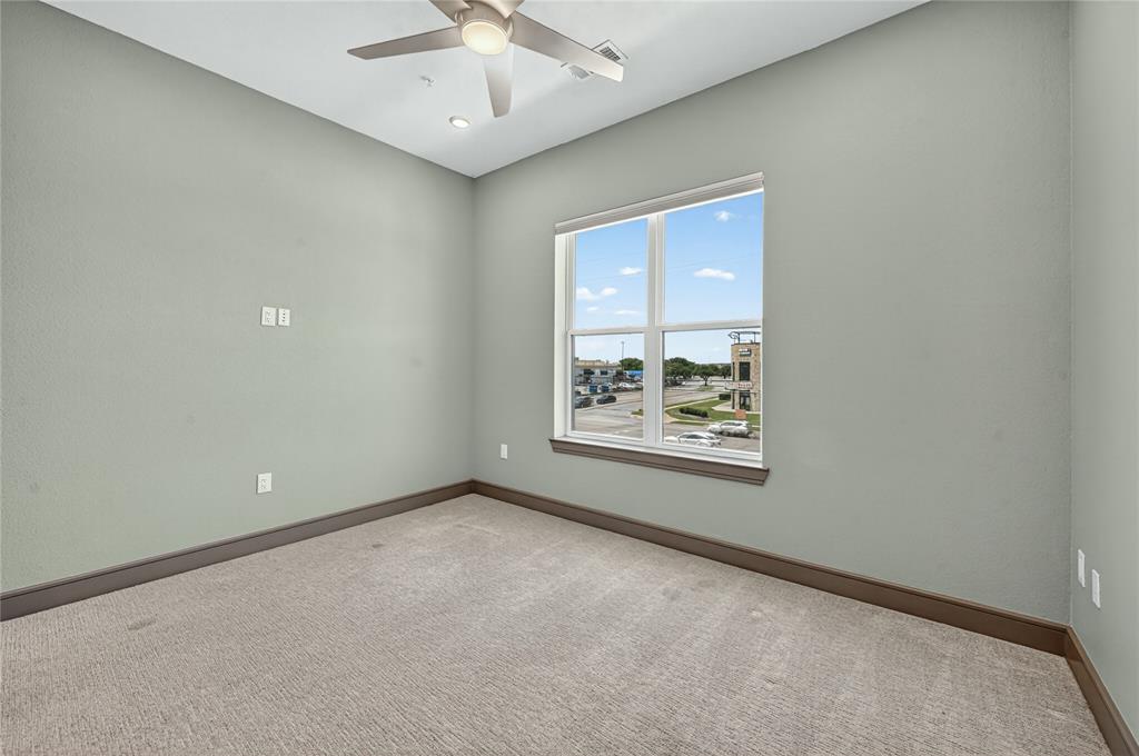 2700 Old Denton Road, Unit 2259 Carrollton, TX 75007 - Photo 25 of 39 an empty room with a window