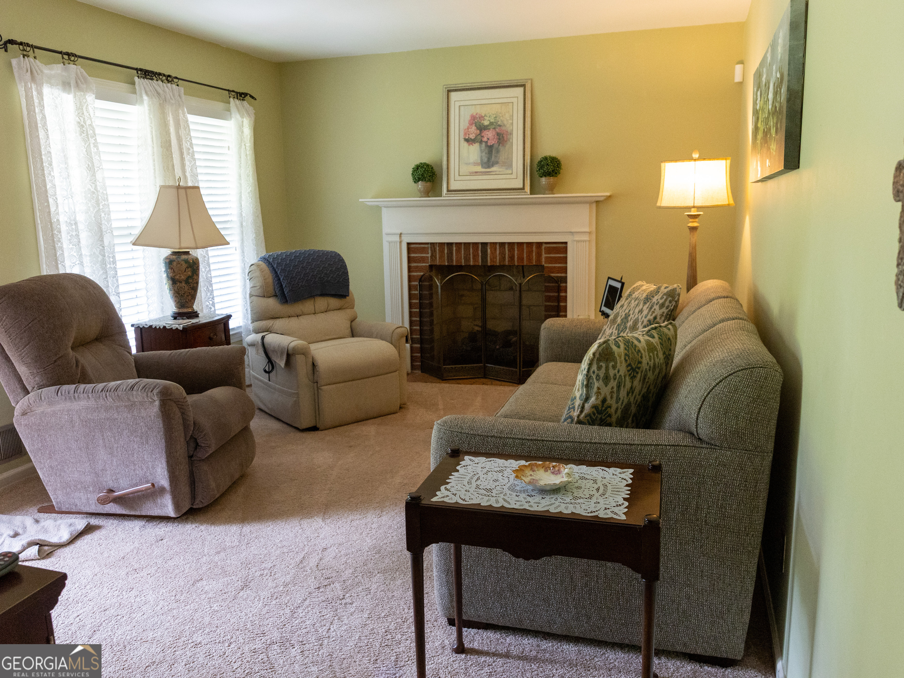 508 Ridgecrest Drive Elberton, GA 30635 - Photo 10 of 29 a living room with furniture and a fireplace