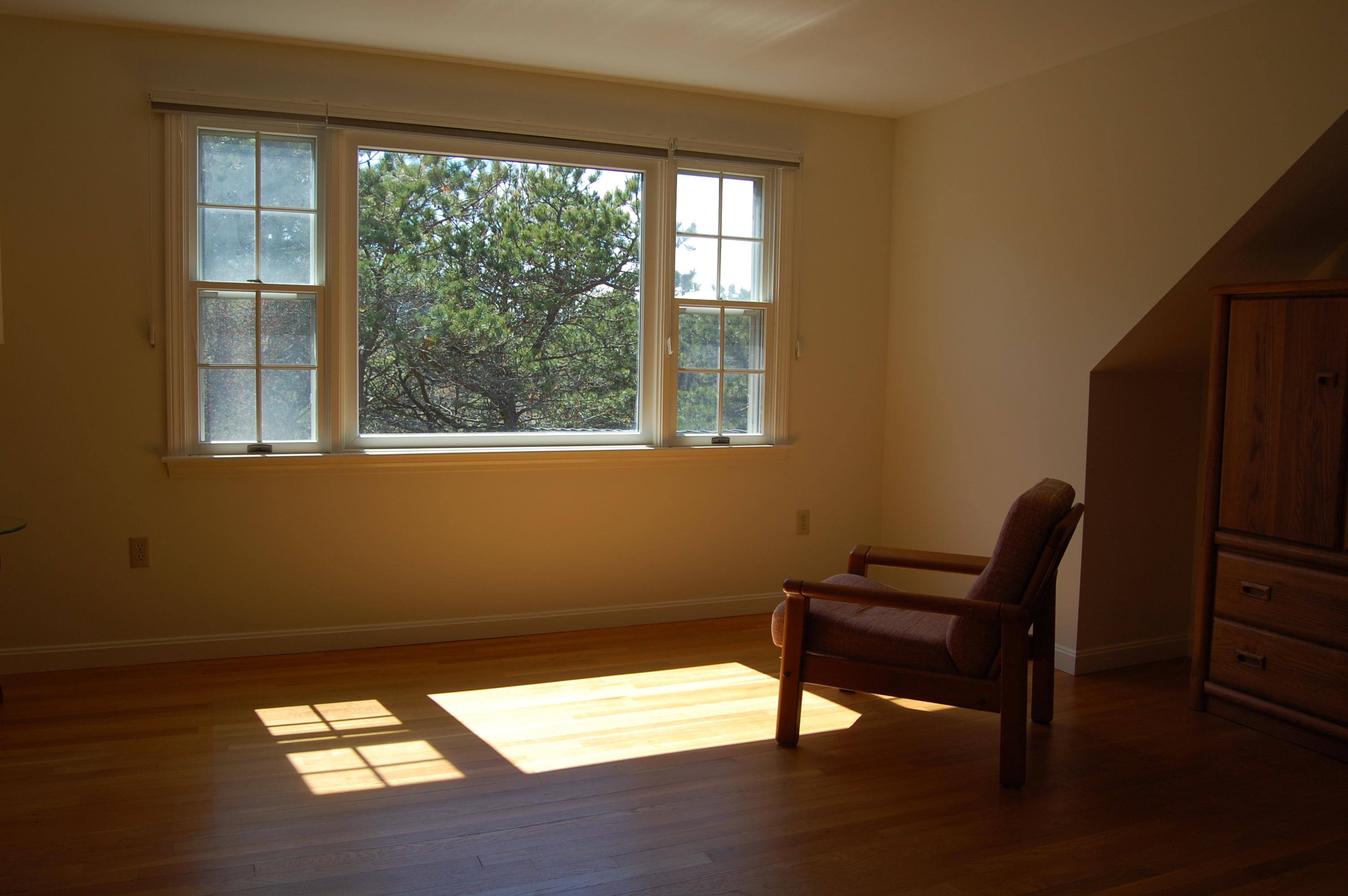 140 Salt Works Road Eastham, MA 02642 - Photo 31 of 49 wooden floor in an empty room with a window
