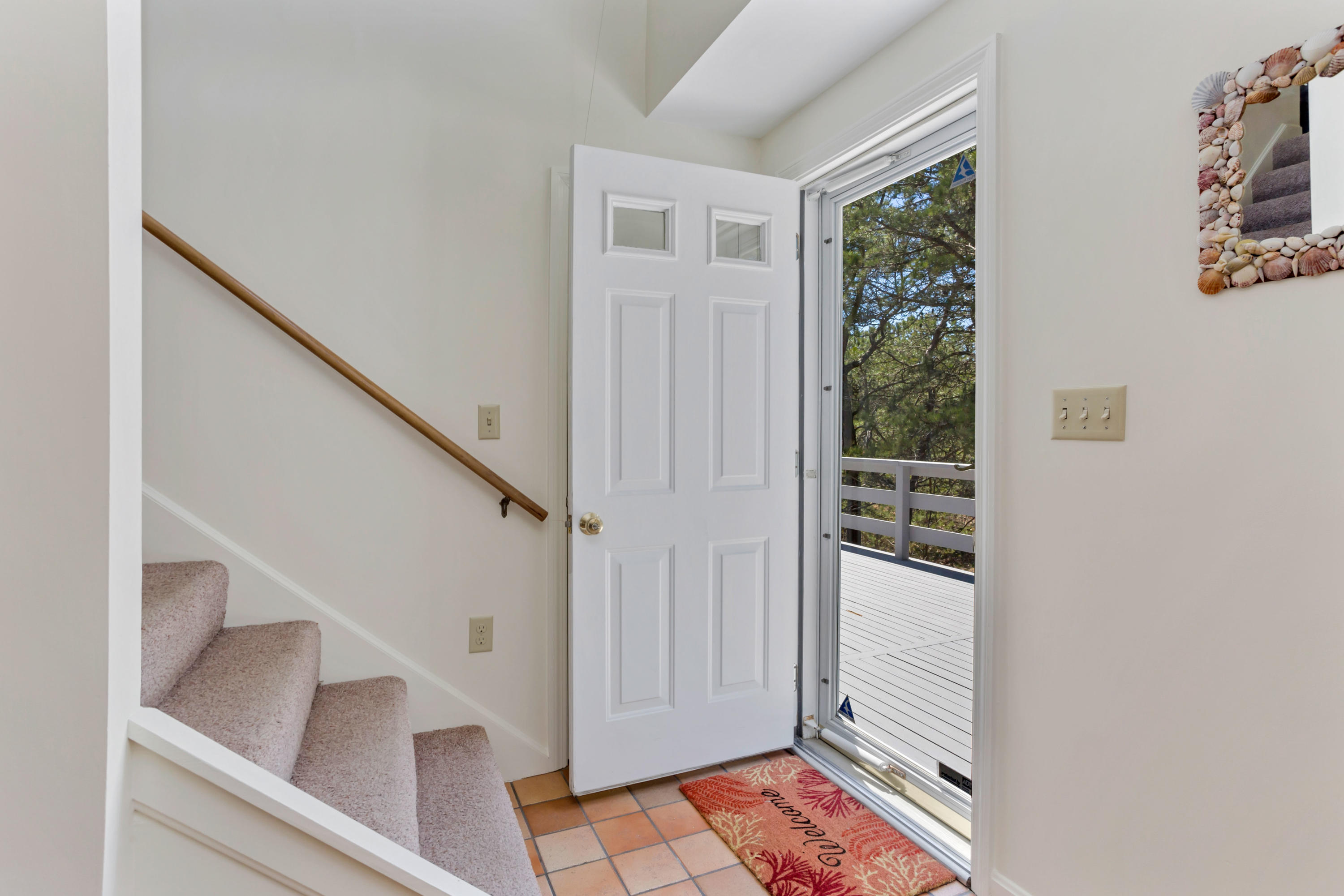 140 Salt Works Road Eastham, MA 02642 - Photo 5 of 49 a view of hallway with stairs and wooden floor