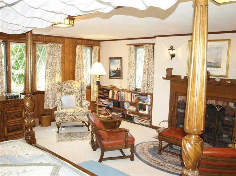 9 Arrowhead Farm Road Truro, MA 02666 - Photo 11 of 30 a living room with furniture and large windows