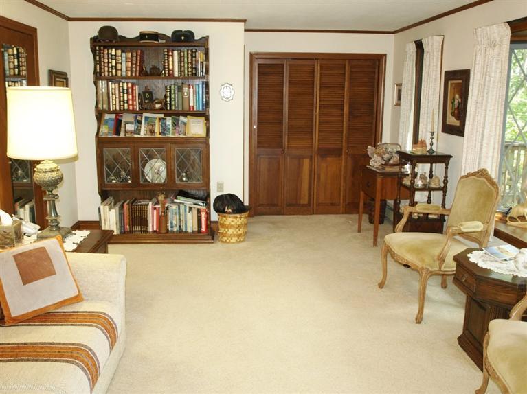 9 Arrowhead Farm Road Truro, MA 02666 - Photo 15 of 30 a bedroom with furniture and natural light