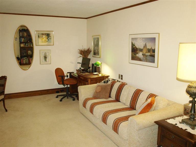 9 Arrowhead Farm Road Truro, MA 02666 - Photo 16 of 30 a bedroom with a bed and furniture