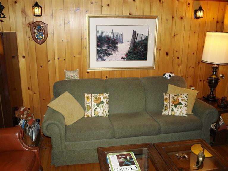 9 Arrowhead Farm Road Truro, MA 02666 - Photo 19 of 30 a living room with furniture and a bed