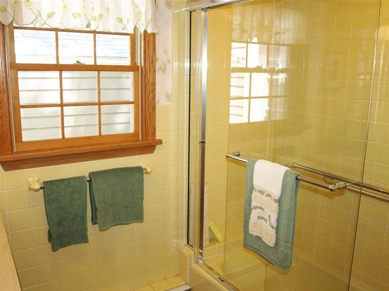9 Arrowhead Farm Road Truro, MA 02666 - Photo 28 of 30 a bathroom with a window and a shower