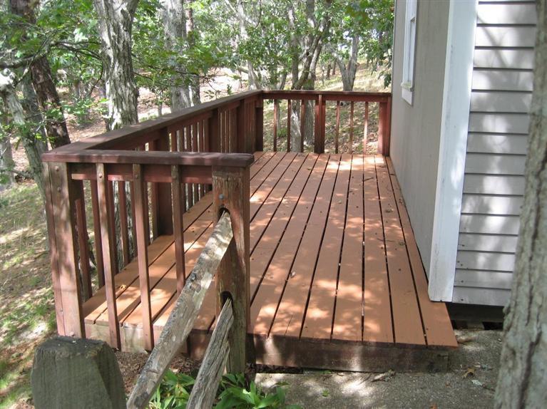 9 Arrowhead Farm Road Truro, MA 02666 - Photo 5 of 30 a view of wooden balcony
