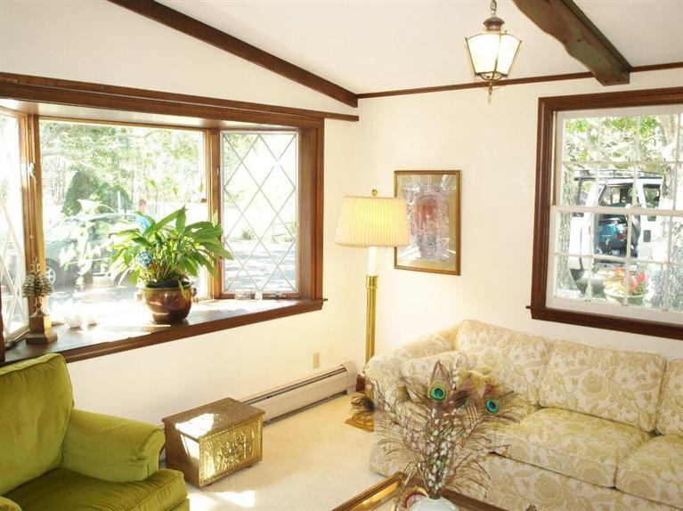 9 Arrowhead Farm Road Truro, MA 02666 - Photo 10 of 30 a living room with a large window