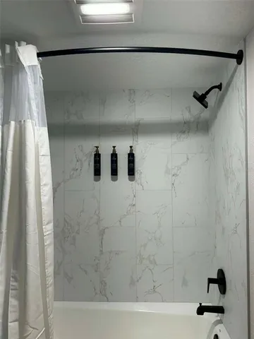 a view of a livingroom with furniture