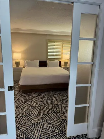 a view of a door and a window