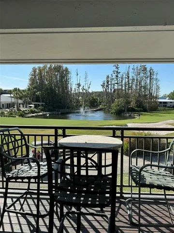 a view of a chairs and table on the terrace