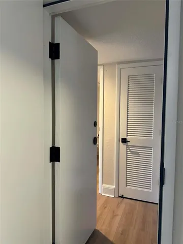 a view of empty room with windows