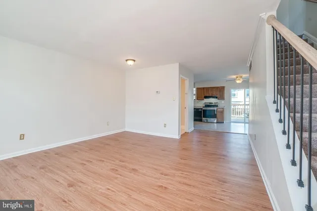 a view of a livingroom with wooden floor