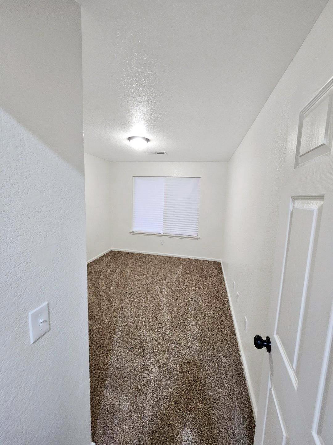 1963 Pontelli Court Stockton, CA 95207 - Photo 19 of 25 an empty room with windows