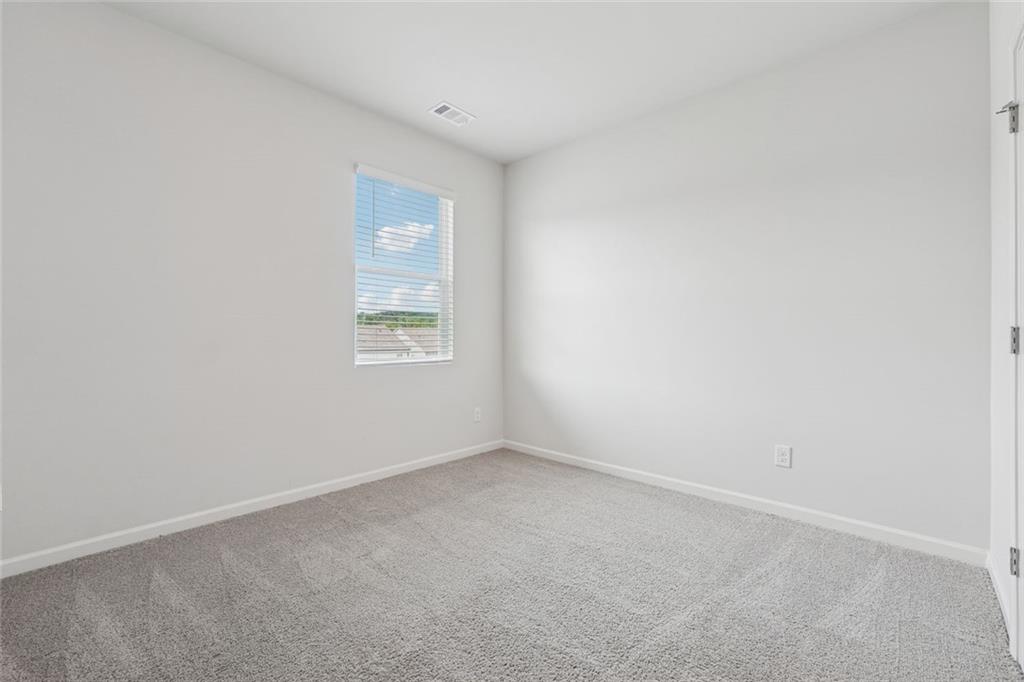 96 Quail Bend Way Dallas, GA 30157 - Photo 36 of 57 an empty room with a window