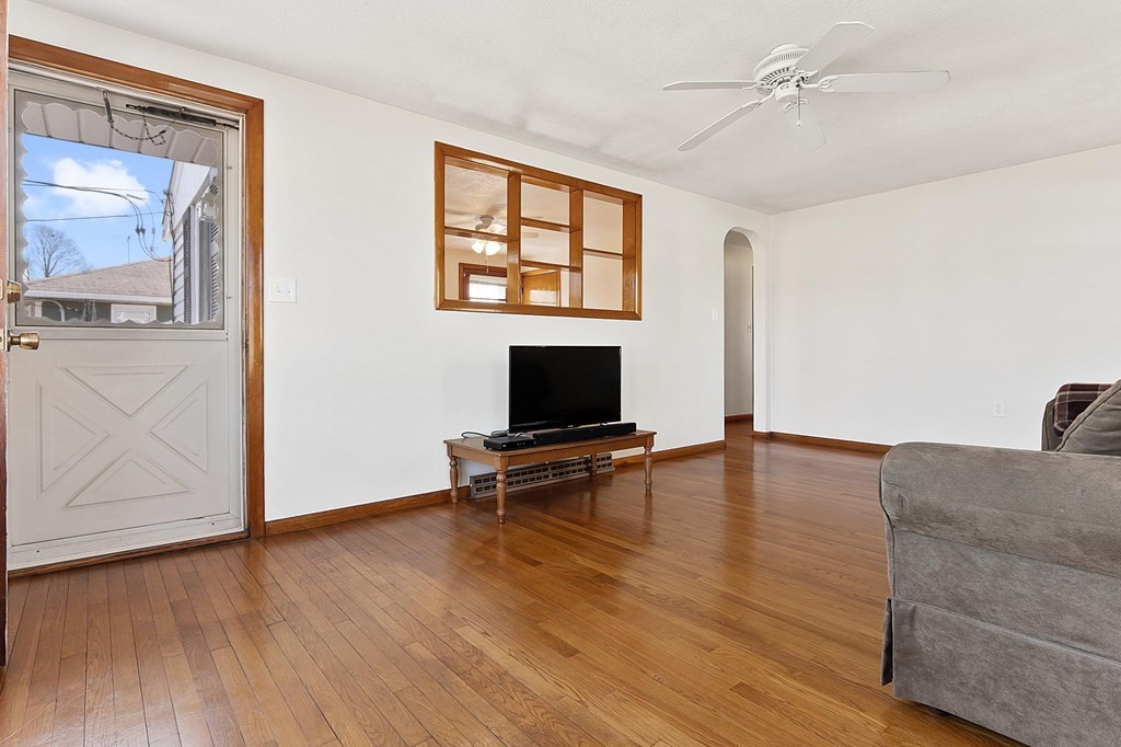 20 Davis Terrace Peabody, MA 01960 - Photo 14 of 25 a living room with furniture and a wooden floor
