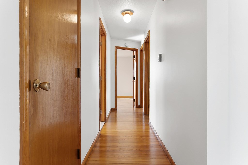 20 Davis Terrace Peabody, MA 01960 - Photo 15 of 25 a view of a hallway with wooden floor