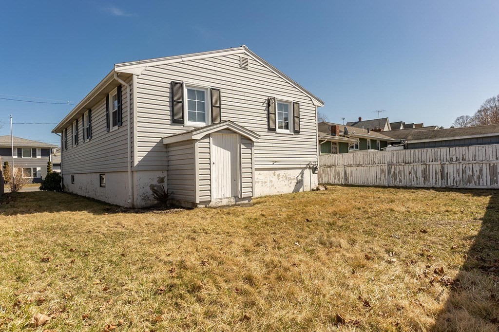 20 Davis Terrace Peabody, MA 01960 - Photo 6 of 25 a front view of a house with a yard
