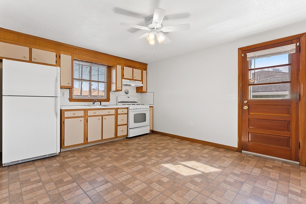 20 Davis Terrace Peabody, MA 01960 - Photo 8 of 25 a view of kitchen with stainless steel appliances cabinets and a window