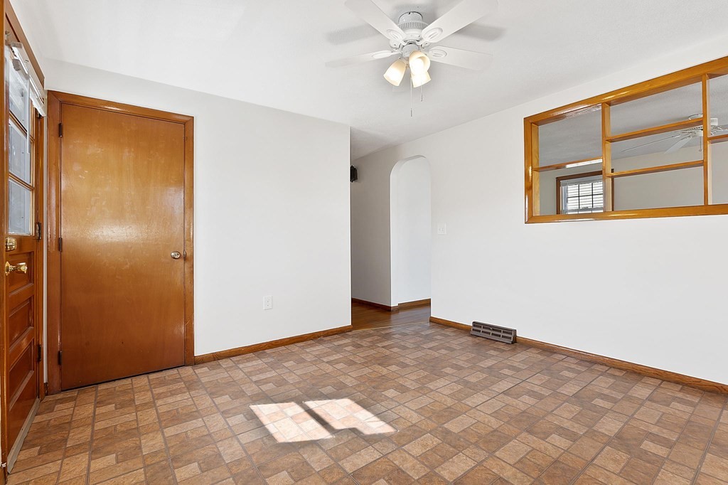 20 Davis Terrace Peabody, MA 01960 - Photo 10 of 25 a view of an empty room with window and wooden floor